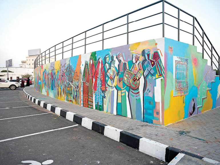Artists create 133sqm mural to celebrate Sur’s cultural heritage