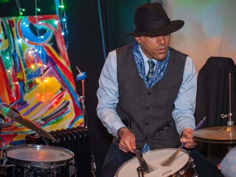Omani in a trilby - jazz percussionist Zehy al Dhabari