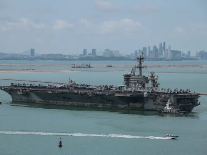 Rust covered USS Abraham Lincoln docks in Thailand