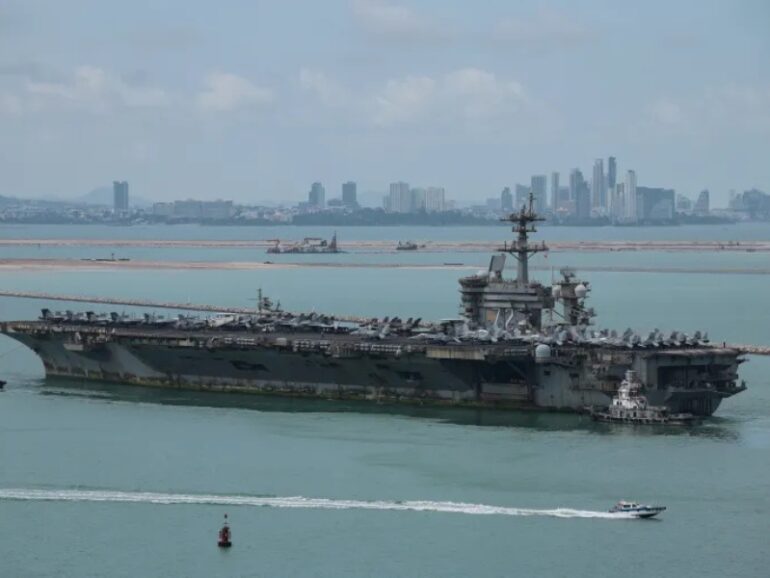 Rust covered USS Abraham Lincoln docks in Thailand
